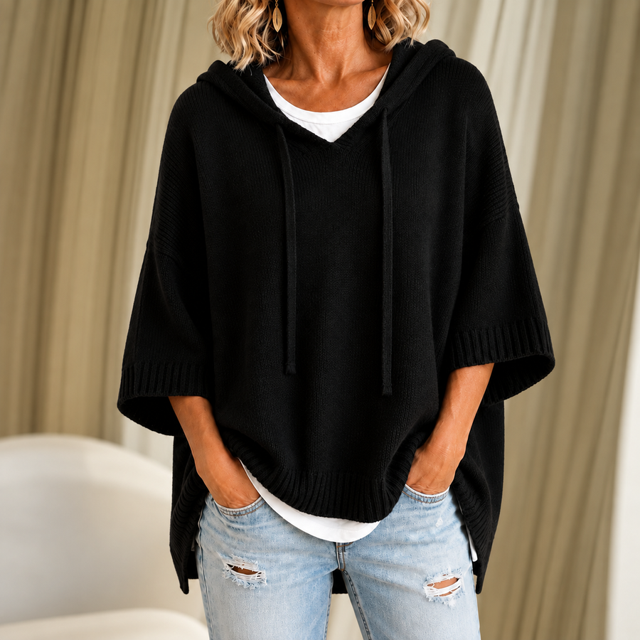 Oriana | Gebreide poncho met capuchon en driekwartmouwen